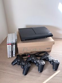 PS3 super slim + 4 games + 3 controllers