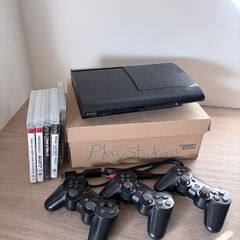 PS3 super slim + 4 games + 3 controllers