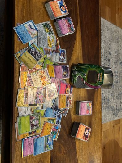 Surging Sparks Bundle Approx. 400 Cards & Paradox Clash Collector Tin