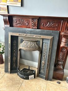 Victorian-style cast iron fireplace