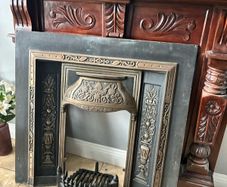 Victorian-style cast iron fireplace