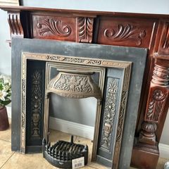 Victorian-style cast iron fireplace
