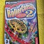 Rollercoaster Tycoon 2 Pc cd rom games Original Image 2