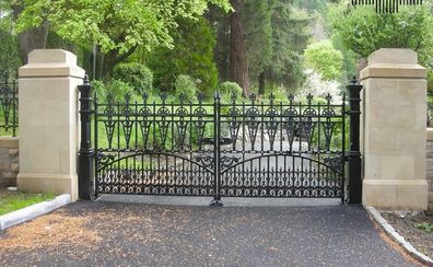Set of brand new solid cast iron gates with posts