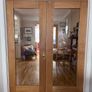 Solid wood internal double doors with glass panels Image 2
