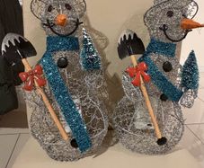 2 Christmas showman decorations
