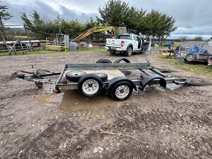 bryan james car carrying trailer Brian