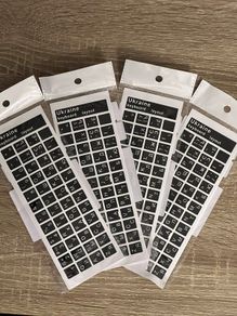 High-quality black glossy Ukrainian keyboard stickers.