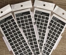 High-quality black glossy Ukrainian keyboard stickers.