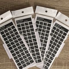 High-quality black glossy Ukrainian keyboard stickers.