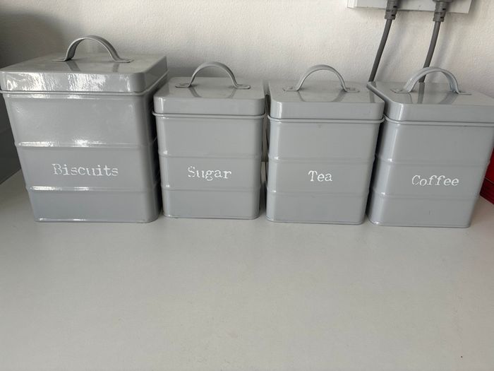 Sugar, tea, coffee and biscuit tins