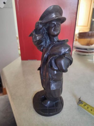 Genesis bronze statue of a boy in man's uniform In perfect condition.