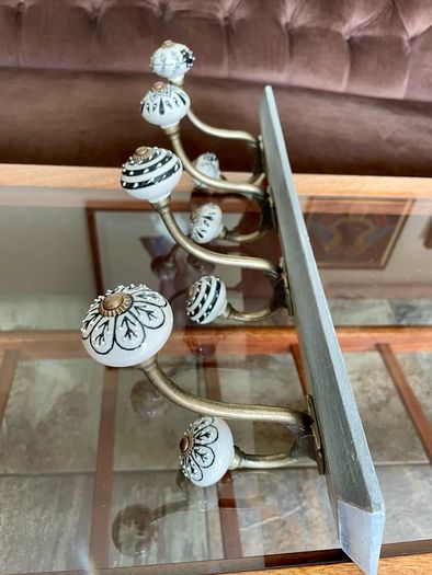 New Unused Stylish Entryway Mounted Ceramic and Brass Coat Hanger