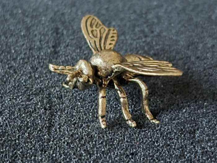 3 brass bees. Solid brass.