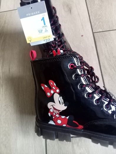 girls Disney boots size by 1....light up soles