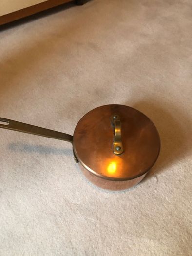 Vintage castle copper saucepans
