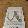 infinity symbol necklaces feature a delicate chain and pendant, new never opened Image 3