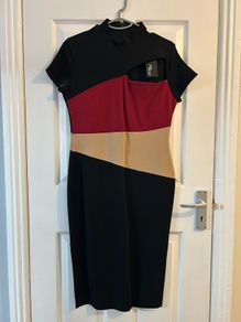 Never worn dress , still with tag .