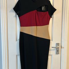 Never worn dress , still with tag .