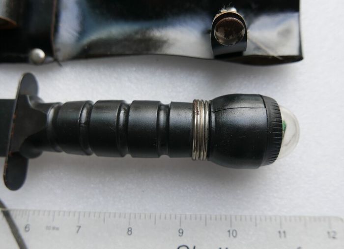 Vintage 1980s Survival Knife with compass and a storage compartment in the knife handle