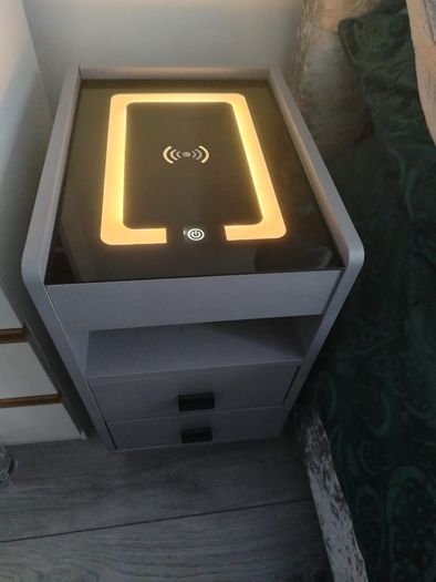 Smart bedside locker with wireless charging and LED light