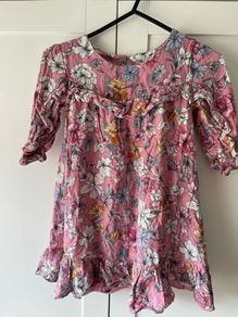 Dunnes pink floral dress with ruffle details and keyhole back
