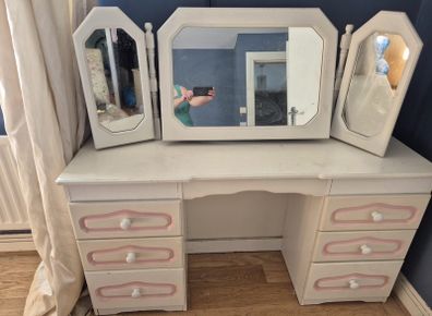 Dressing table with mirrors .