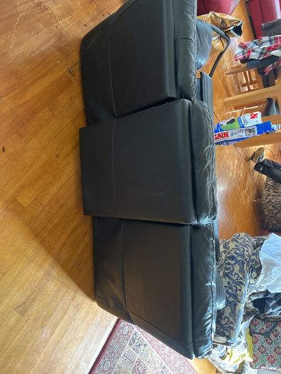 Black leather sofa. Good condition, just needs a bit of a clean