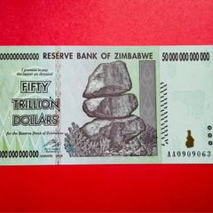 Zimbabwe  Fifty Trillion Dollars  2008 Verified Under Uv Light  ( Uncirculated ) Pick. 90 Scarce