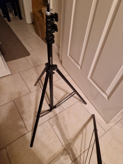 NEEWER, 2 Photography Tripods and feet and also 5ft circular Silver Light enhancer all in new condition and in lovely cases