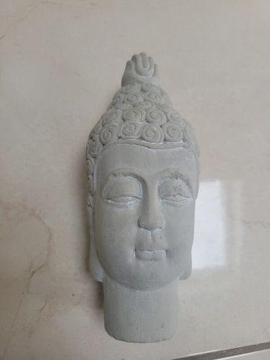 small concrete buddah decor piece