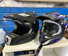 Dirtbike helmets and bike stand
