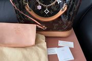 Original Louis Vuitton Ambre with pochette, dust bag, box, leaflets