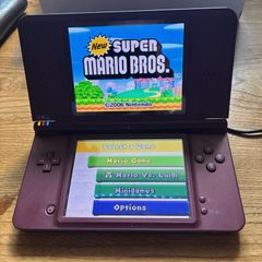 Nintendo DSi XL burgundy with Super Mario