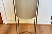 Grey elevated plant pot
