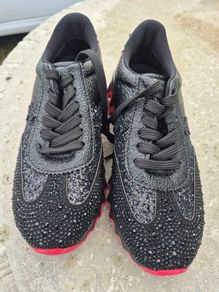 Christian Louboutin's shark runners new