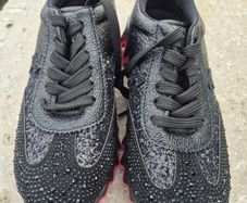 Christian Louboutin's shark runners new