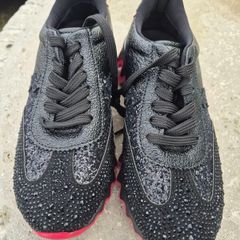 Christian Louboutin's shark runners new