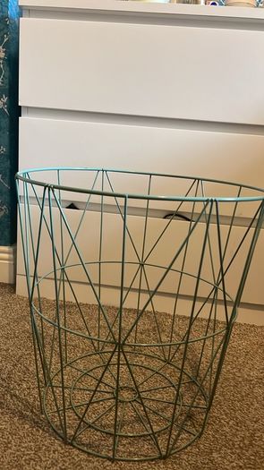 Side table with storage basket