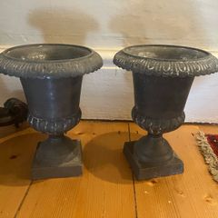 Pair of grey urn ornaments