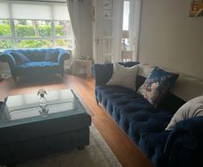3 & 2 seater navy velvet chesterfield style couches with matching footstool with removable glass top