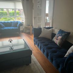3 & 2 seater navy velvet chesterfield style couches with matching footstool with removable glass top