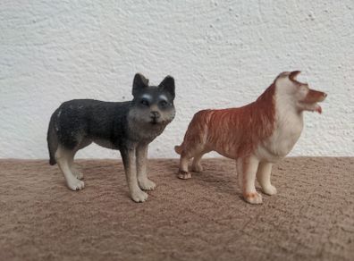 Two toy dog figures