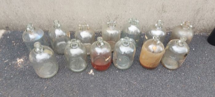 13 x demi johns,glass jars ,used condition, needs a clean,,buyer collects,,10 euros each or a deal  for the 13 ,sold as is