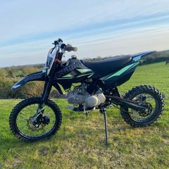 STOMP 140cc Dirt bike and helmet