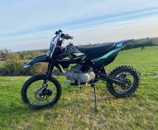 STOMP 140cc Dirt bike and helmet
