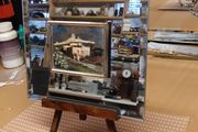 Mirror on stand with picture