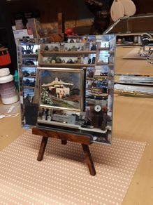 Mirror on stand with picture