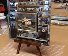 Mirror on stand with picture