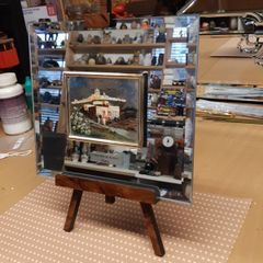 Mirror on stand with picture